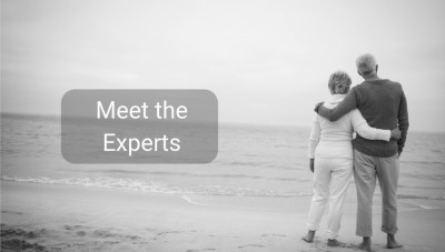 A retired couple on the beach.|